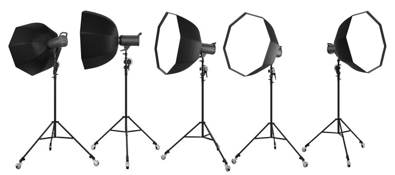 Photo studio lighting stands with flash and octobox isolated on the white.