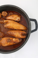 stuffed squid cooked with sauce and meat balls