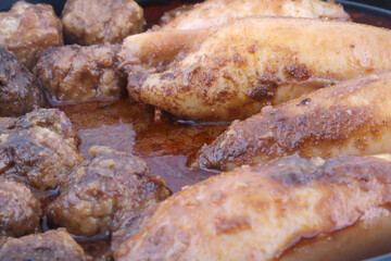 stuffed squid cooked with sauce and meat balls