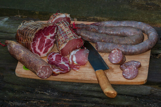 Cold cuts of famous corsican specialities, coppa, lonzu, figatellu and saucisse.