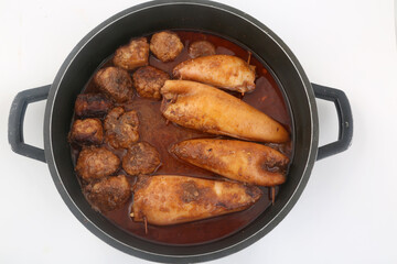 stuffed squid cooked with sauce and meat balls