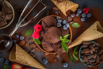 Dark Chocolate Ice cream. A lot of chocolate ice-cream with chocolate beans, powder and pieces,...
