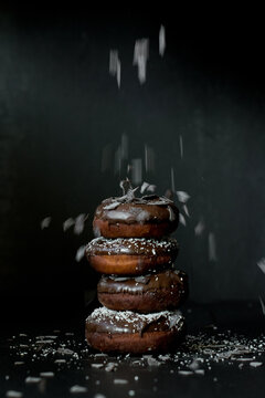 Homemade baked donuts with chocolate and coconut