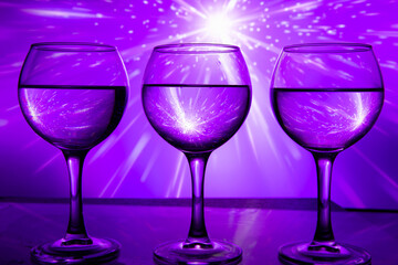 3 glasses of wine in a row on a beautiful background