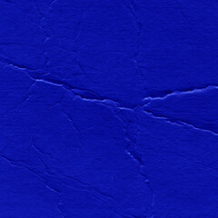 Cardboard blue abstract pattern texture close-up. Retro old paper background. Grunge concrete wall. Vintage blank wallpaper.