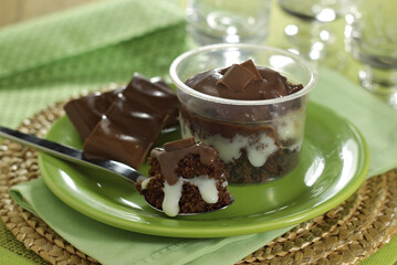 Chocolate flavored pot cake with spoon