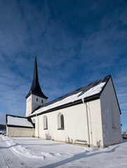 Fototapeta na wymiar Winter view over Sånga church on the Drottningholm island in Stockholm