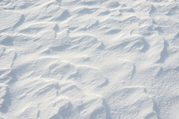Fresh clean white snow background texture. Winter background with frozen snowflakes and snow...