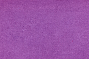 Cardboard purple abstract pattern texture close-up. Retro old paper background. Grunge concrete wall. Vintage blank wallpaper.
