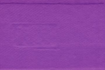 Cardboard purple abstract pattern texture close-up. Retro old paper background. Grunge concrete wall. Vintage blank wallpaper.