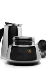 Coffee pot isolated on the white background. A studio photo showing the bottom part of coffee maker with a selective focus point.