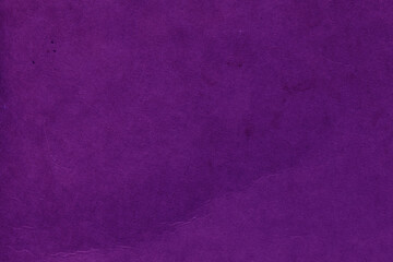 Cardboard purple abstract pattern texture close-up. Retro old paper background. Grunge concrete wall. Vintage blank wallpaper.