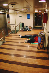Italy, people sleep in the ferry corridors