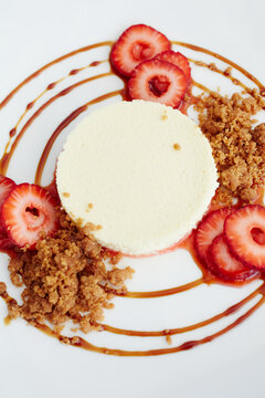 Fromage blanc cheesecake with organic strawberries, graham cracker streusel, balsami