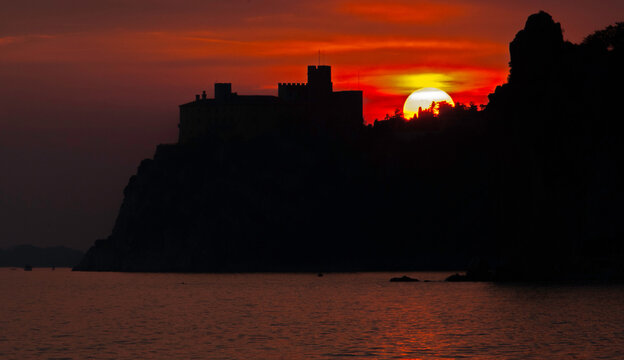 general view of Duino Castle at sunset