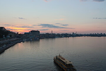 Naklejka premium sunset over the river