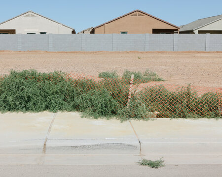 Partially completed suburban housing development on outskirts of Phoenix