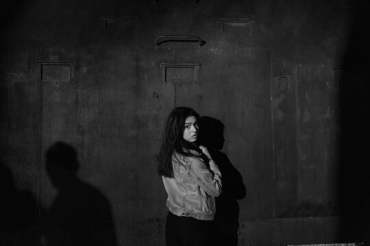 Woman goofing around at night