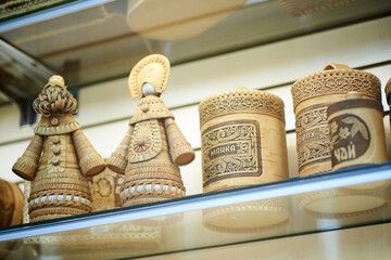Birch bark products: dolls, croup bags. Russian inscriptions: semolina, peas, tea