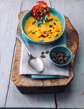 Pumpkin soup with coppa chips