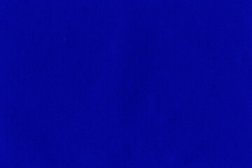 Cardboard blue abstract pattern texture close-up. Retro old paper background. Grunge concrete wall. Vintage blank wallpaper.