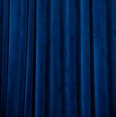 Blue fabric background. Curtain abstraction