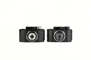 Old 35mm bakelite scaling film camera on white background.