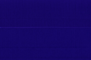 Cardboard purple abstract pattern texture close-up. Retro old paper background. Grunge concrete wall. Vintage blank wallpaper.