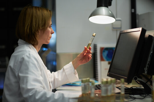 Female doctor working with computer in the hospital lab
