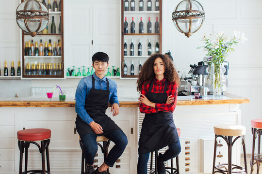 Portrait of cool workers in a nice coffee shop.