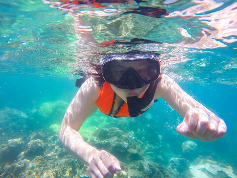 Asian girl snorkeling,Samui,Thailand
