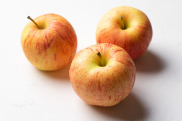 Red apple fruit on white background