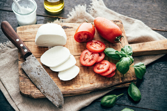 Food: Ingredients for caprese,mozzarella di buffala and san marzano tomato