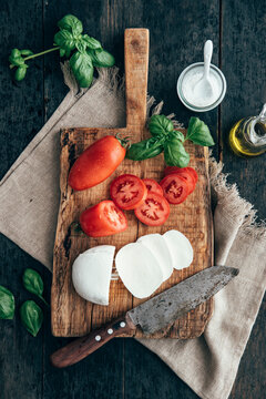 Food: Ingredients for caprese,mozzarella di buffala and san marzano tomato
