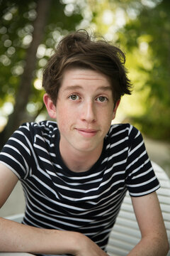 Teenage boy with quizzical expression