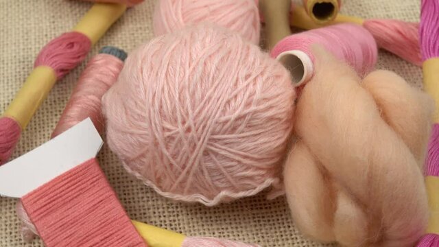 Pink threads and yarns for sewing, embroidery, felting and knitting, needlework 