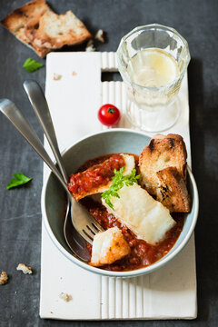 Fried codfish with tomato sauce