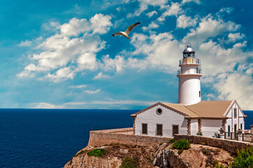 White lighthouse at Cala Ratjada, Majorca, Spain