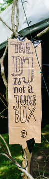 The DJ is not a jukebox sign