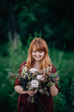 Woman holding beautiful flowers bouquet