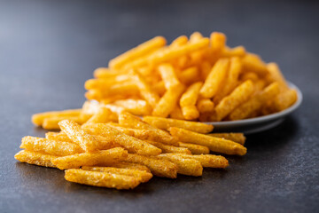 French fries. Salted snack. Potato chips.