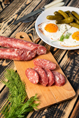 breakfast with egg, sausage and beans