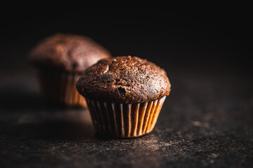 Chocolate muffins. Sweet dark cupcakes.