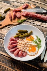 breakfast with egg, sausage and beans