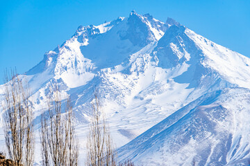 Erciyes Top of Erciyes Mountain. Height of 3,864 metres is the highest mountain in Cappadocia and central Anatolia. It is a volcano - obrazy, fototapety, plakaty