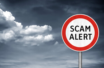 Road sign warning - Scam Alert