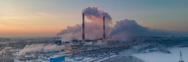 Smoking industrial zone factory chimneys. Environmental problem of pollution of environment and air...