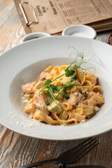 Avocado and salmon fettuccine, appetizing magazine photo