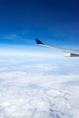 Fototapeta na wymiar Airplane wing. View from plane window