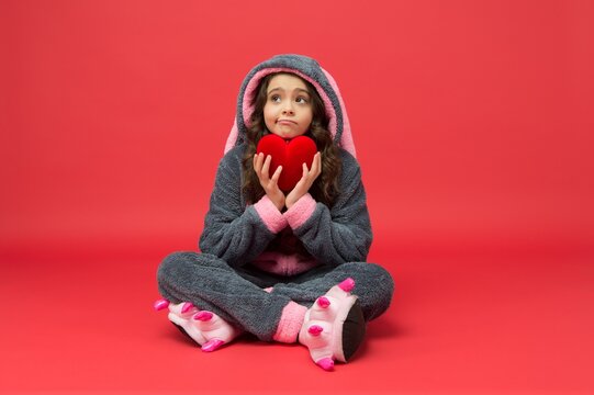 Be Well. Unhappy Child Hold Red Heart. Providing Cardiovascular Care. Pediatric Health Care.